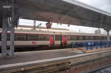 train station with train in the city