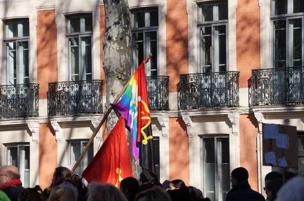 Stock image Toulouse, France - Feb. 2023 - Demonstrators from trade unions or left-wing political parties opposing the government's pension reform (socialists and communists), gathering on Arnaud-Bernard Square