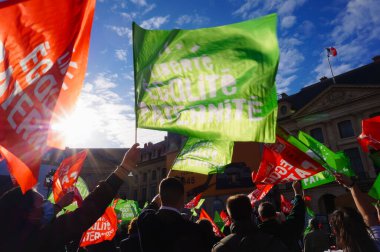 Paris, France - Oct. 10, 2020 - Group of cheerful young female supporters of La Manif pour Tous, dressed up as French 