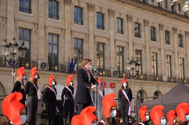 Paris, France - Oct. 10, 2020 - Group of cheerful young female supporters of La Manif pour Tous, dressed up as French 