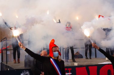 Paris, France - Oct. 10, 2020 - Group of cheerful young female supporters of La Manif pour Tous, dressed up as French 