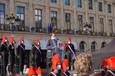 Paris, France - Oct. 10, 2020 - Group of cheerful young female supporters of La Manif pour Tous, dressed up as French 