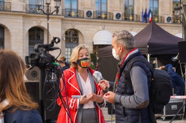 Paris, France - Oct. 10, 2020 - Ludovine de la Rochre, President of La Manif Pour Tous (LMPT), is interviewed by the French media at Marchons Enfants' demonstration against the bioethics bill