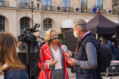 Paris, France - Oct. 10, 2020 - Ludovine de la Rochre, President of La Manif Pour Tous (LMPT), is interviewed by the French media at Marchons Enfants' demonstration against the bioethics bill