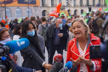 Paris, France - Oct. 10, 2020 - Ludovine de la Rochre, President of La Manif Pour Tous (LMPT), is interviewed by the French media at Marchons Enfants' demonstration against the bioethics bill