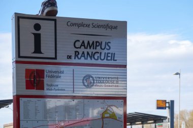 Toulouse, France - March 15, 2024 - An information board with a map on the main campus of Toulouse III-Paul Sabatier University, in Rangueil Science Complex, where it occupies about 100 hectares clipart