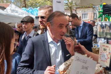 Bessieres, France - April 1, 2024 - Eric Zemmour's walkabout at the village market during the Easter Giant Omelette, amid the campaign for the European elections; he is the president of 