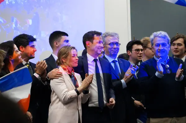 stock image Toulouse, France - April 26, 2024 - Party executives get on stage to chant the National Anthem, at the end of an election rally with the 3 top LR candidates, F.X. Bellamy, C. Imart and C. Gomart