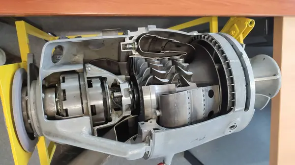 stock image Toulouse, France - Jan. 15, 2024 - Aircraft engine giving a sectional view of the combustion chamber and turbine blades inside, kept for students at MFJA aeronautical mechanical engineering school