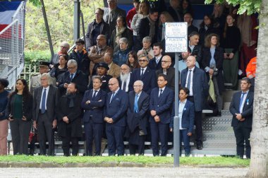 Toulouse, France - May 8, 2024 - Elected representatives, guests in the official gallery at the War Memorial, attending the Victory Day celebration; among them are councillors Serp, Scoraille, Sentous clipart