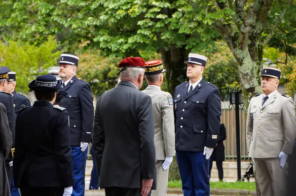 stock image Toulouse, France - May 8, 2024 - Gendarmerie (French military police) and Army officers are awarded honorary decorations y authorities for professional achievments, at the Victory Day commemoration