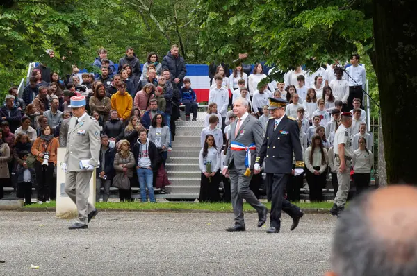 Stock image Toulouse, France - May 8, 2024 - Arrival of Prefect Pierre-Andr Durand and Mayor Jean-Luc Moudenc at the Memorial for the Victory Day military ceremony, preceded by an Army captain, protocol officer