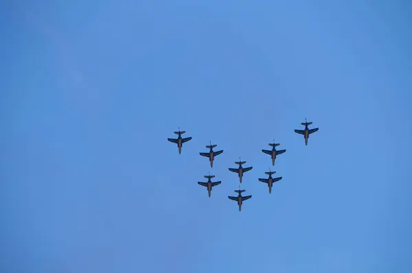 stock image Lherm, France - May 11, 2024 - Formation flying with 8 Alpha Jets of the Patrouille de France, the French Air Force's prestige aerobatic team, performing during AirExpo at Muret-Lherm Aerodrome