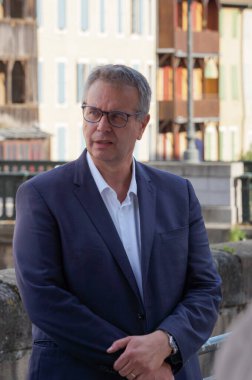 Castres, France - July 5, 2024 - Representative of Tarn, Member of the National Assembly Frdric Cabrolier (RN) during an election meeting with right-wing union fellow candidate Guilhem Carayon  clipart