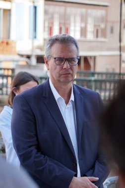 Castres, France - July 5, 2024 - Representative of Tarn, Member of the National Assembly Frdric Cabrolier (RN) during an election meeting with righ-wing union fellow candidate Guilhem Carayon clipart