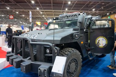 Paris Nord Villepinte, France - June 21, 2024 - Sherpa APC, an armored personnel carrier in service with the French BRI (SWAT unit), exhibited by its manufacturer Arquus at Eurosatory Arms Show clipart