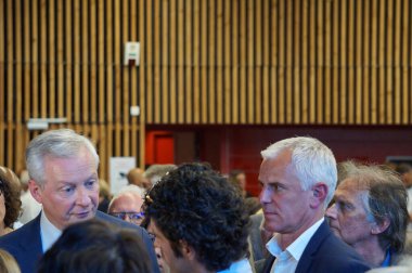 Saint-Orens, France - June 3, 2024 - Economy and Finance Bruno Le Maire meets supporters of President Emmanuel Macron, after a political rally amid the election campaign for the European Parliament clipart