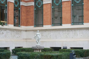 Toulouse, France - Dec. 11, 2024 - Female sculpture outside the Study and Heritage Library of Toulouse, built in the 1930s; the institution is in charge of the legal deposit for printing clipart