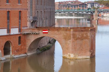 Toulouse, France - Oct. 19, 2024. Restored brick 18th century facade of Htel-Dieu Saint-Jacques, a former poorhouse, now house to the HQ of the University Hospital and a UNESCO World Heritage Site clipart