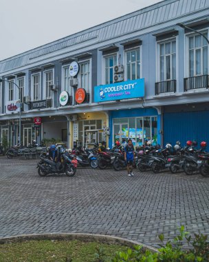 Balikpapan, Indonesia - March 10th, 2024. these shophouses are inside a greater area of a large housing complex in the city. clipart