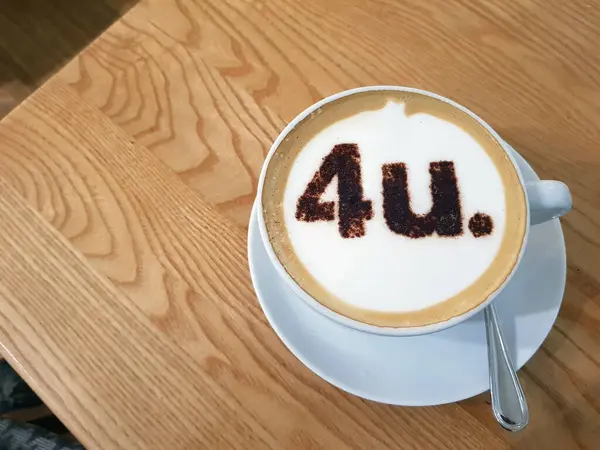 Cappuccino with \'for you\' written on the foam