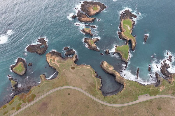 The cold, nutrient-rich waters of the Pacific Ocean wash against the rugged coast of Northern California in Mendocino. This scenic region is a few hours drive north of San Francisco.