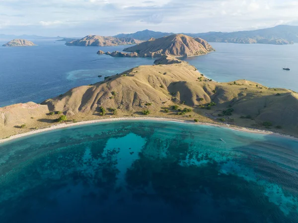 stock image Beautiful coral reefs and idyllic beaches are found on Gili Lau Laut in Komodo National Park, Indonesia. This part of the Lesser Sunda Islands harbors extraordinary marine biodiversity.