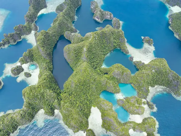 Limestone Islands Balbalol Fringed Reef Rise Raja Ampat Tropical Seascape Stock Photo