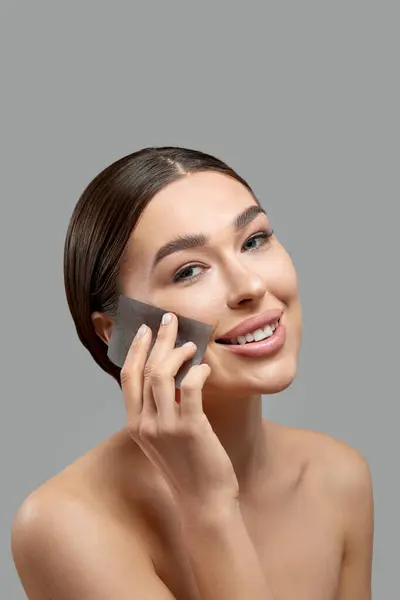 Skin Care Young Woman Removing Oil Face Using Blotting Papers Stock Image