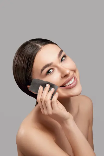 Face Skin Care Smiling Woman Using Facial Oil Blotting Paper Stock Image