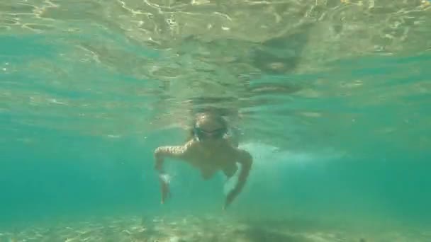 Child Swimming Underwater Blue Sea — Stock Video