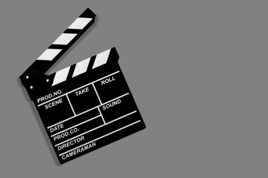 Gri arkaplan fotokopi alanı üzerinde video ve film çekmek için çekim tahtası