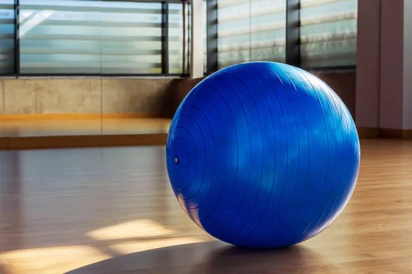 fitness ball in the fitness room with mirrors