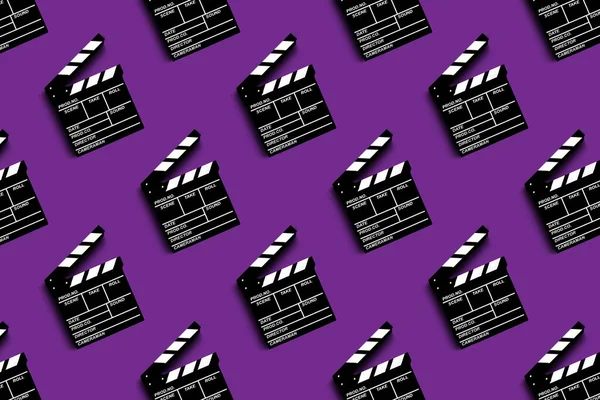 Placa Palmas Para Filmar Vídeo Filmes Padrão Fundo Roxo — Fotografia de Stock