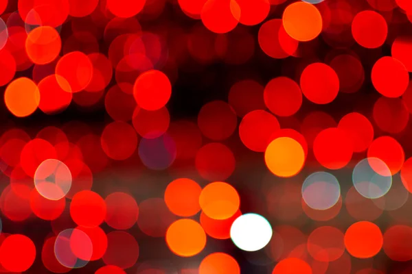 defocus light red bokeh background blurred lights of red light bulbs