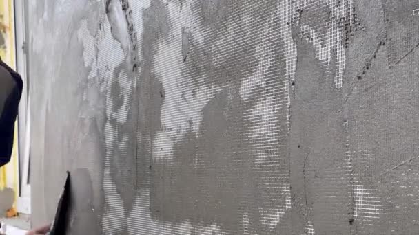 Крупный План Стены Обработанной Вручную Малярной Лопаткой Фасадная Армирующая Сетка — стоковое видео