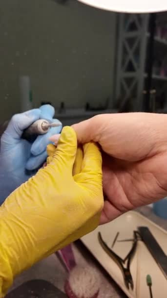 Hardware Manicure Close Gel Polish Removal Nail Technician Wearing Yellow — Stock Video