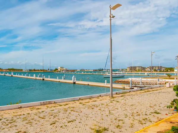 stock image Empty boat marina with view of ocean, sunny day with blue skies and light clouds. Empty concrete pier without boat and ocean view. Economic collapse due to the Cuban American crisis