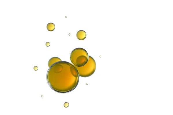 流れる上に黄色のジュース泡 — ストック写真