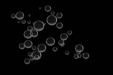 Siyah arkaplan üzerine su damlalarını aydınlat.