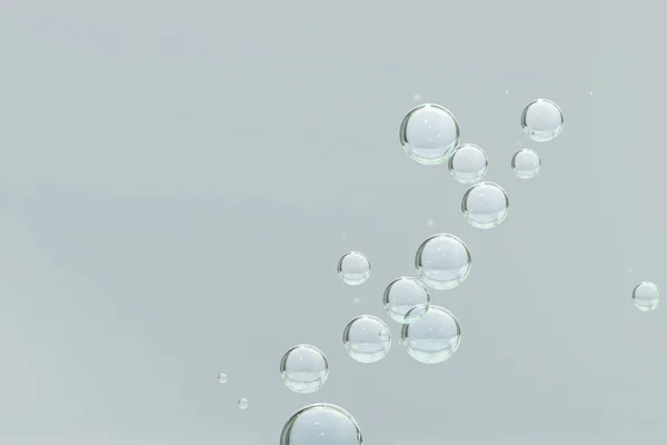 Levegő Buborékok Áramlik Vízben Fényes Szürke Háttér — Stock Fotó