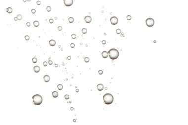 Küçük kabarcıklar beyaz bir yüzey üzerinde uçuyor. İzole edilmiş, karbonatlı su..