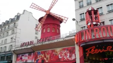 January 22, 2023 - Paris, France. The red building of the Moulin Rouge during the day. Historic world-famous cabaret theater during the day