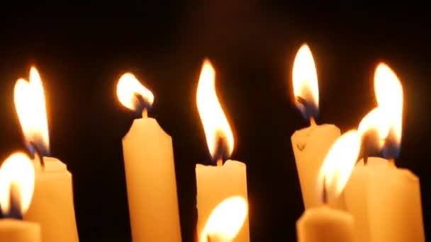 Long White Religious Candles Flames Burning Night Church Close View — Video
