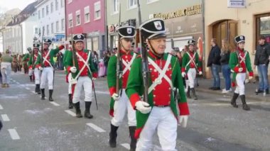 February 12, 2023 - Kehl, Germany: People in carnival costumes in Festive Rosenmontag carnival procession on the occasion of spring in Baden Wurttemberg