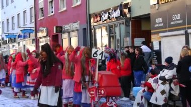 February 12, 2023 - Kehl, Germany: Festive Rosenmontag carnival procession on the occasion of spring in Baden Wurttemberg. People in scary and funny costumes entertain the audience, laugh, play, sing.