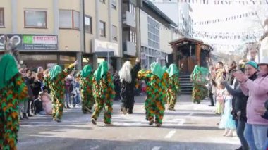 February 12, 2023 - Kehl, Germany: People in scary and funny costumes in Festive Rosenmontag carnival procession on the occasion of spring in Baden Wurttemberg