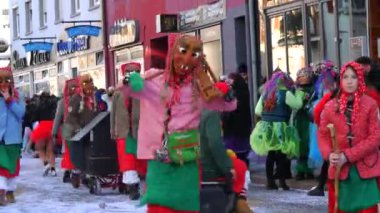 February 12, 2023 - Kehl, Germany: Festive Rosenmontag carnival procession on the occasion of spring in Baden Wurttemberg. People in scary and funny costumes entertain the audience, laugh, play, sing.