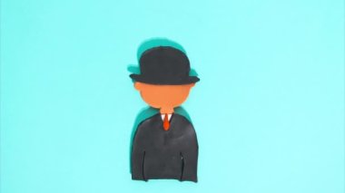 February 15, 2023 - Kehl, Germany: Stop motion animation of plasticine for Valentines Day, the main character in hearts moving on a blue background. Claymotion famous character in art
