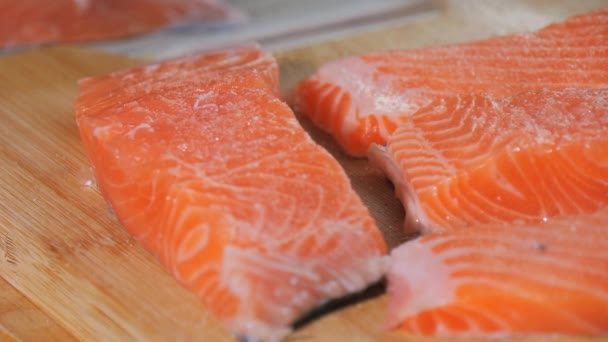 Piece Fresh Red Fish Sprinkled Salt Slow Motion Close View — Stock Video